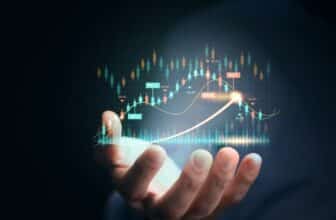 Hand holding virtual forex chart