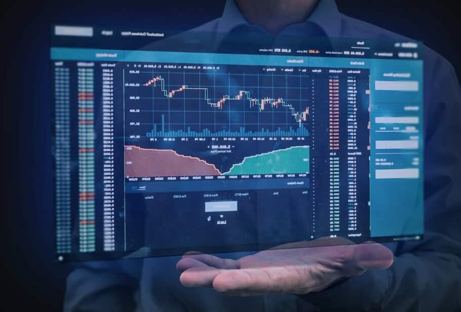 hand holding out virtual trading chart