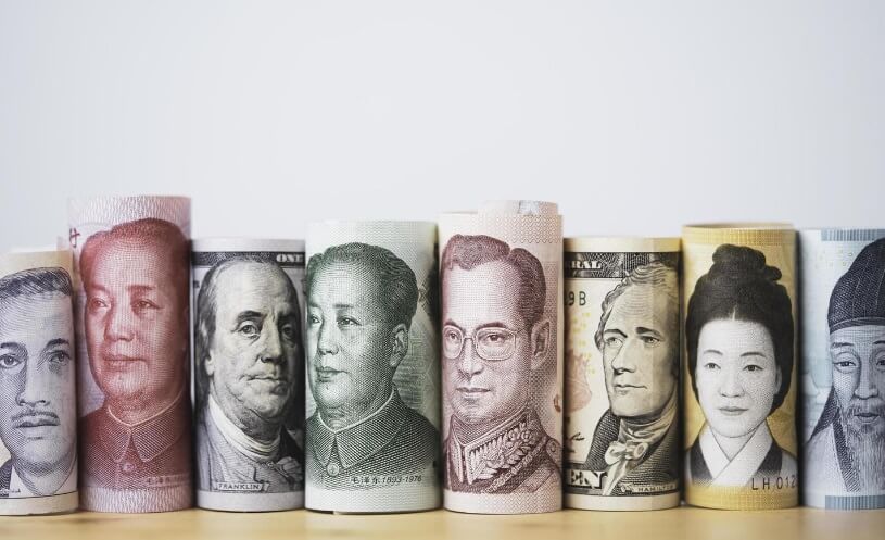 rolls of money on a table top