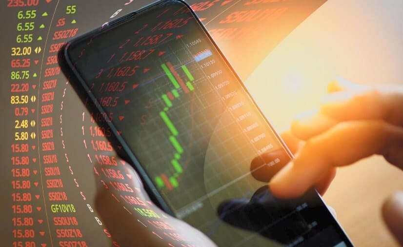 Cellphone showing trading chart going up