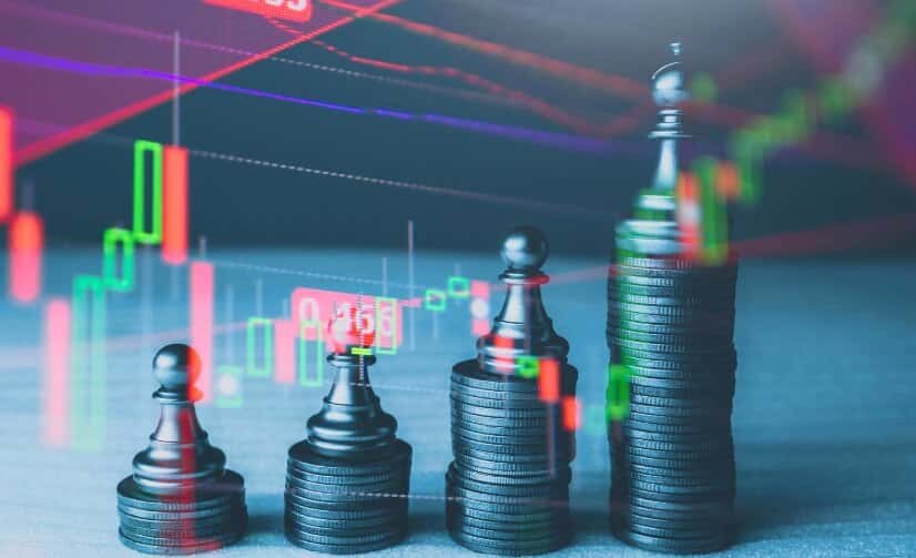 stacked coins and chess pieces representing forex with virtual trading overlay
