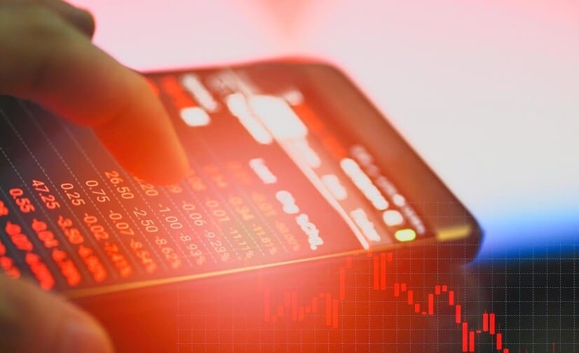 cellphone with red forex chart overlay