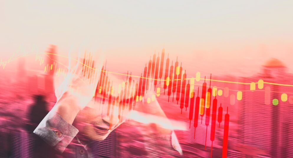 man holding head showing forex trading chart