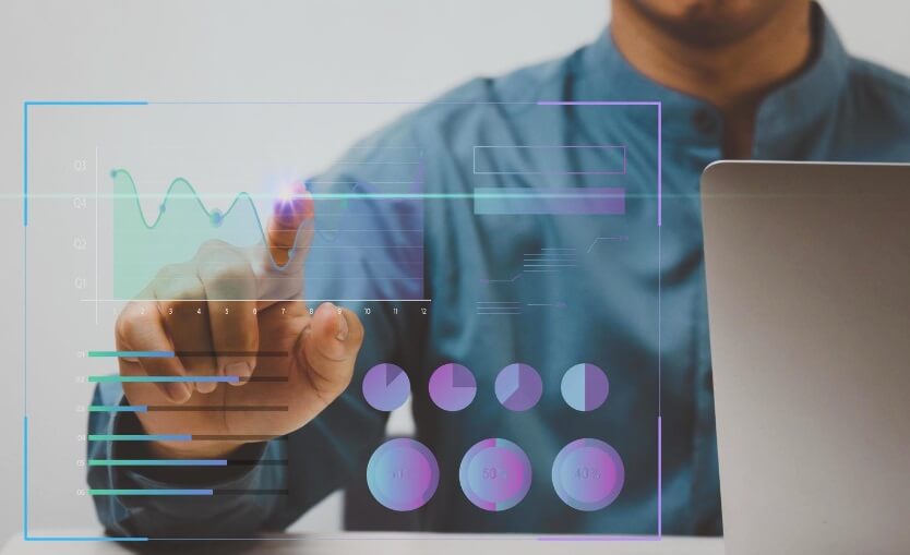 man touching virtual trading chart showing Most Volatile Forex Pairs