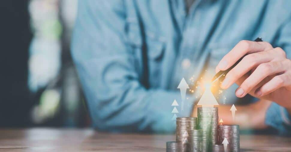 coins on desk showing going up